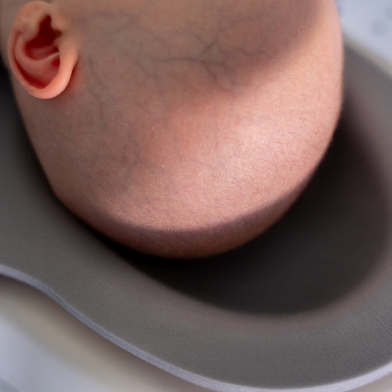 The recessed cup contours to your baby's head