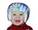 Child wearing a colorful helmet with a blue and white pattern