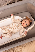 The Perfect Noggin infant sleep system highlighting the anatomical contour for plagiocephaly management and head-shape support.